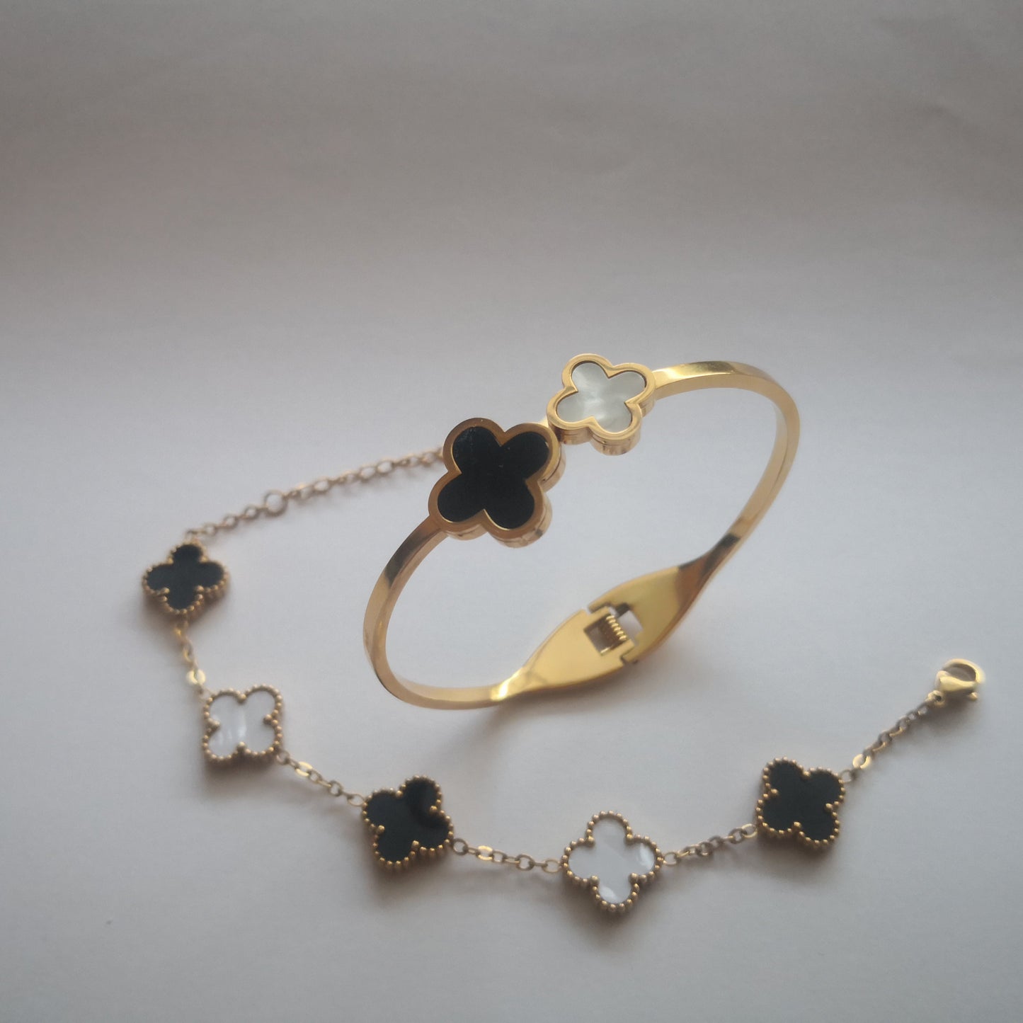 Klaver Armbanden - Goud en Zwart Wit - Intero Sieraden