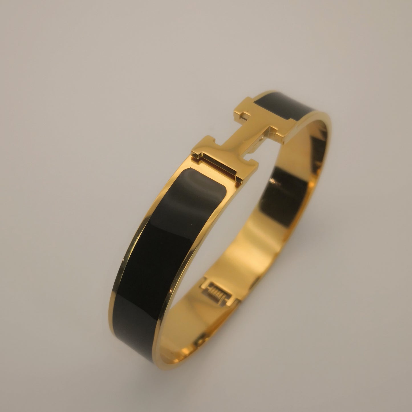 H letter Goudkleurige Armbanden - Intero Sieraden