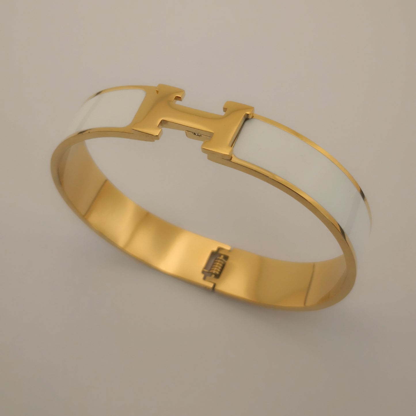 H letter Goudkleurige Armbanden - Intero Sieraden