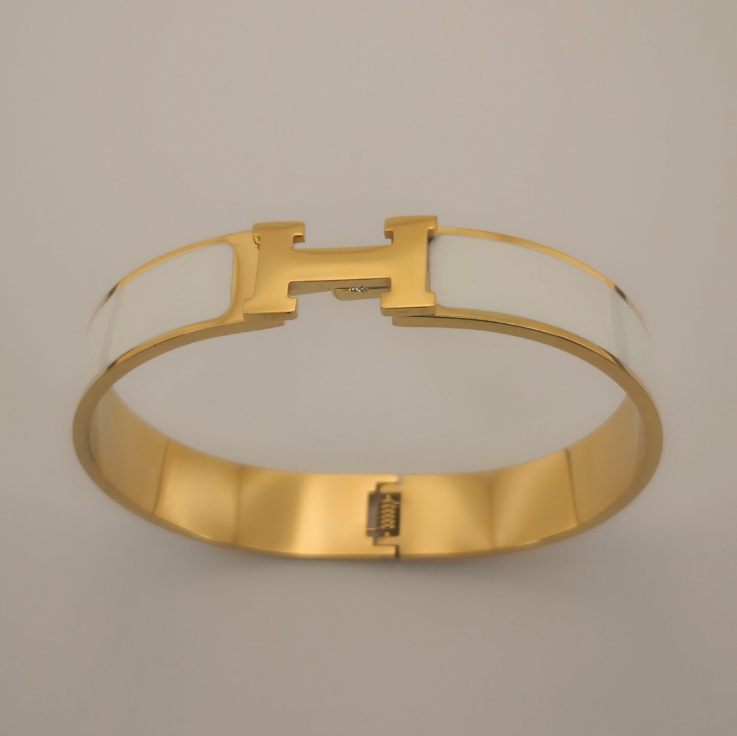H letter Goudkleurige Armbanden - Intero Sieraden