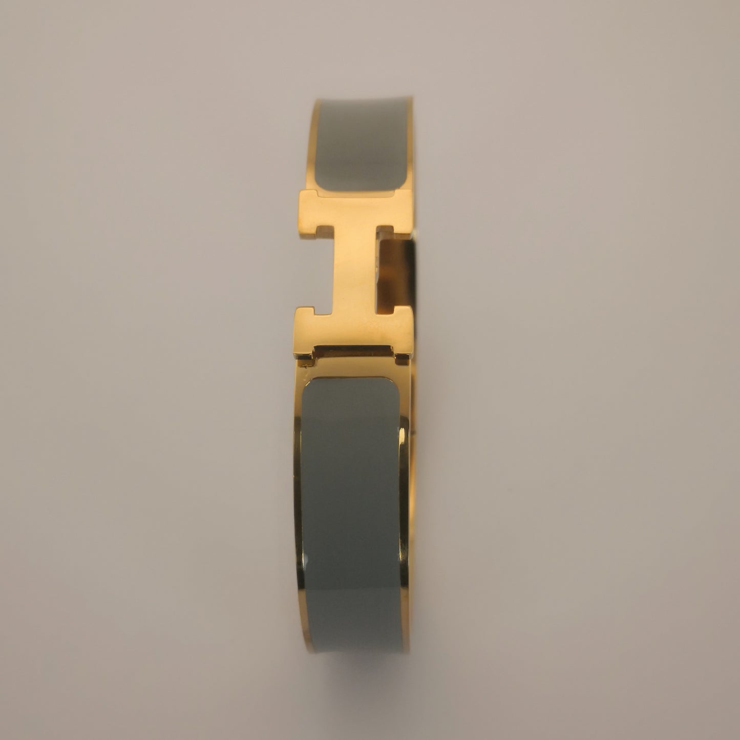 H letter Goudkleurige Armbanden - Intero Sieraden