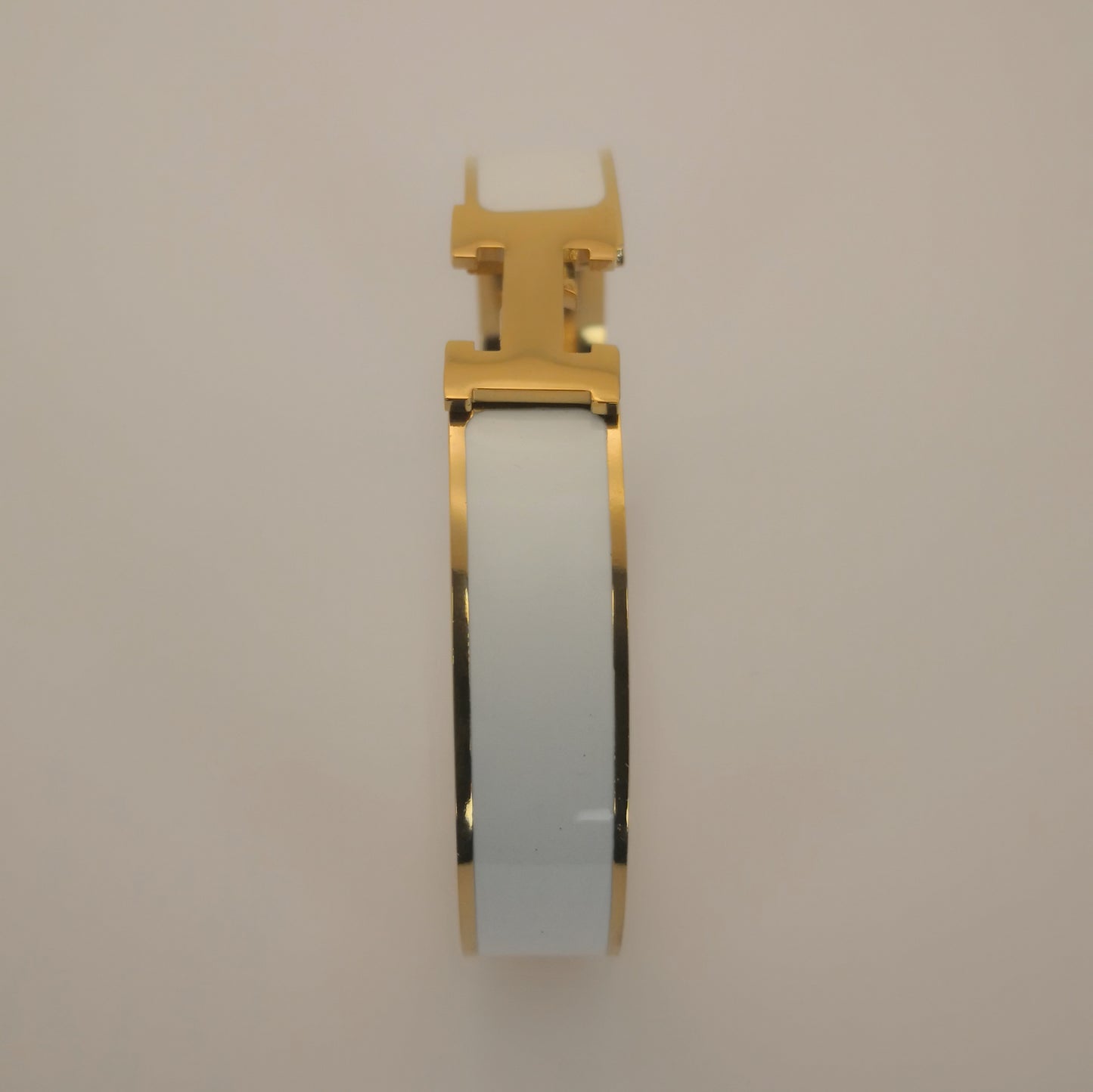 H letter Goudkleurige Armbanden - Intero Sieraden