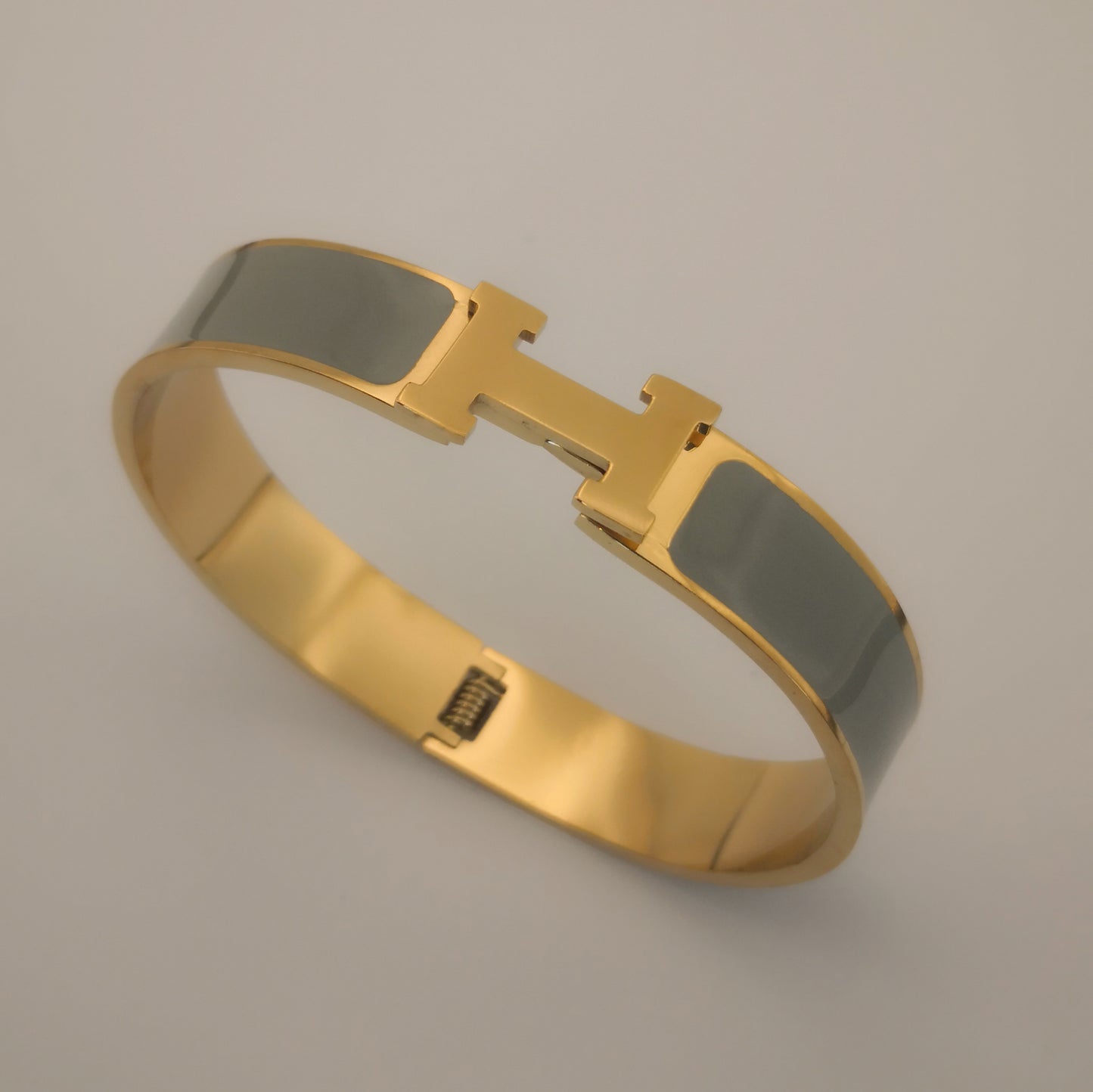 H letter Goudkleurige Armbanden - Intero Sieraden