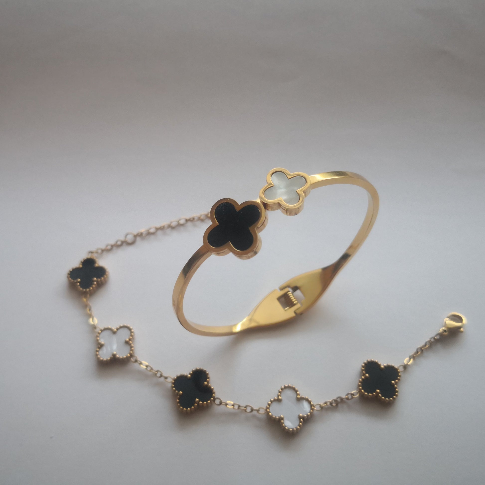 Klaver Armbanden - Goud en Zwart Wit - Intero Sieraden