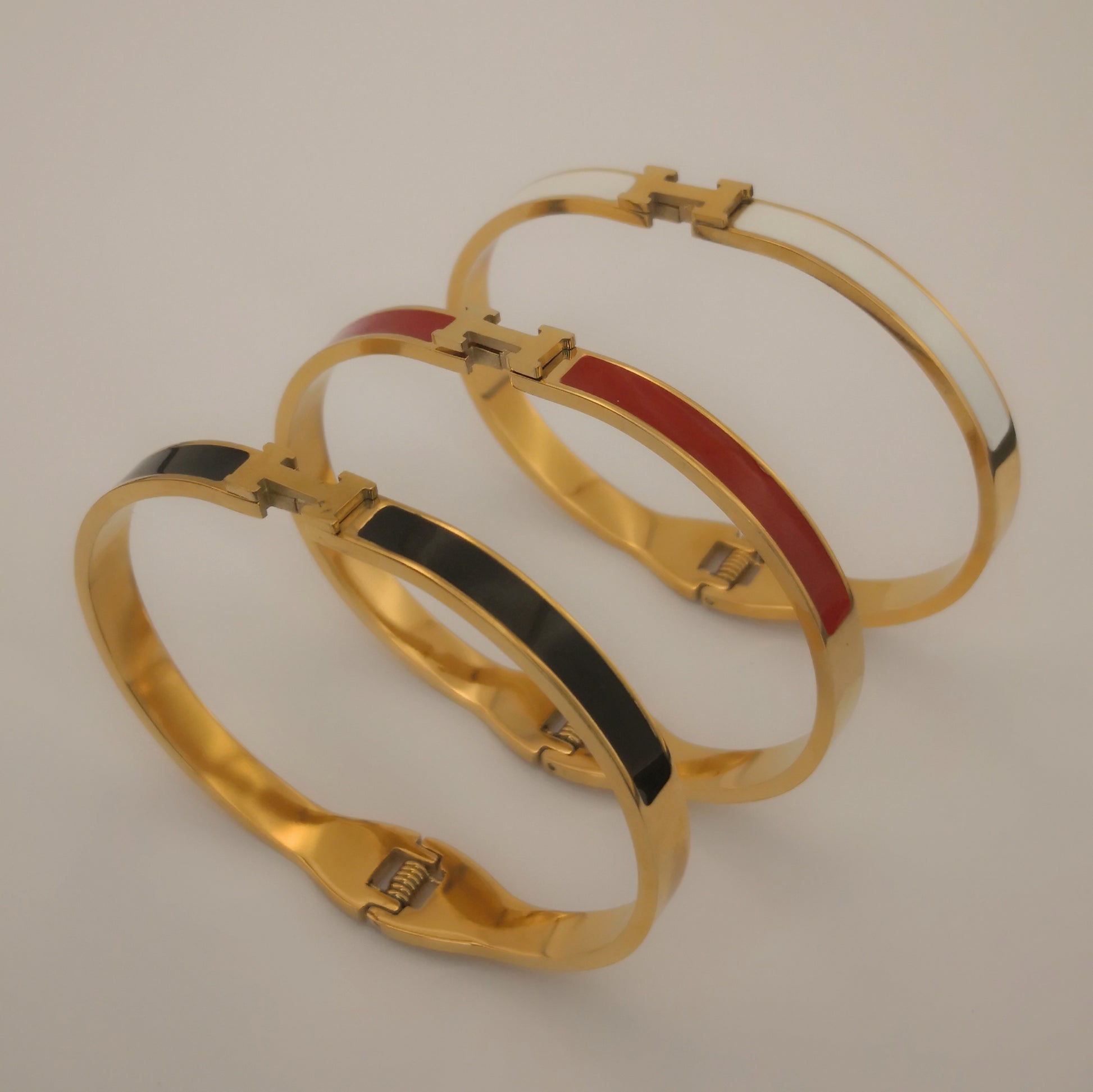 H letter Goudkleurige Armbanden - Dun - Intero Sieraden